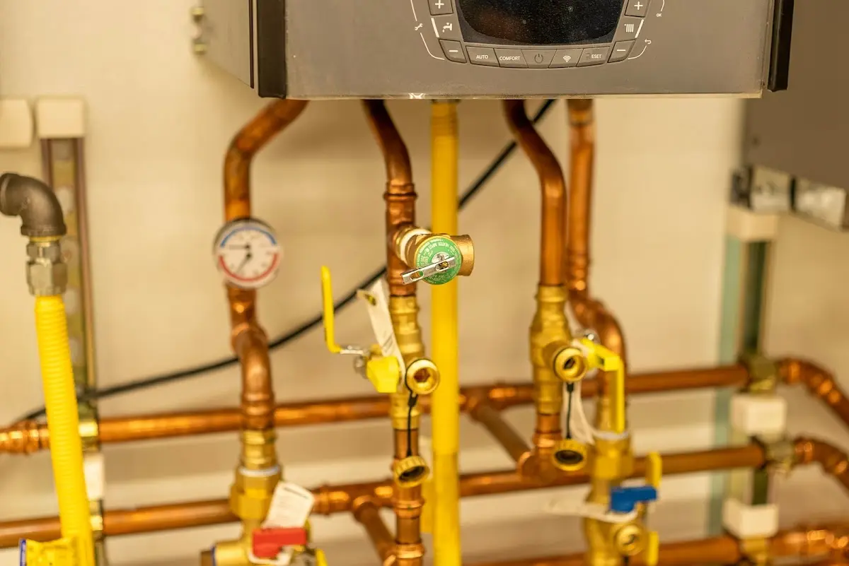 Licensed technician providing Water Heater Installation for a homeowner in Hutchison